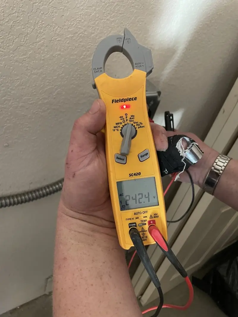 Voltage testing with clamp meter during Aluminum Wiring Replacement in Waverly